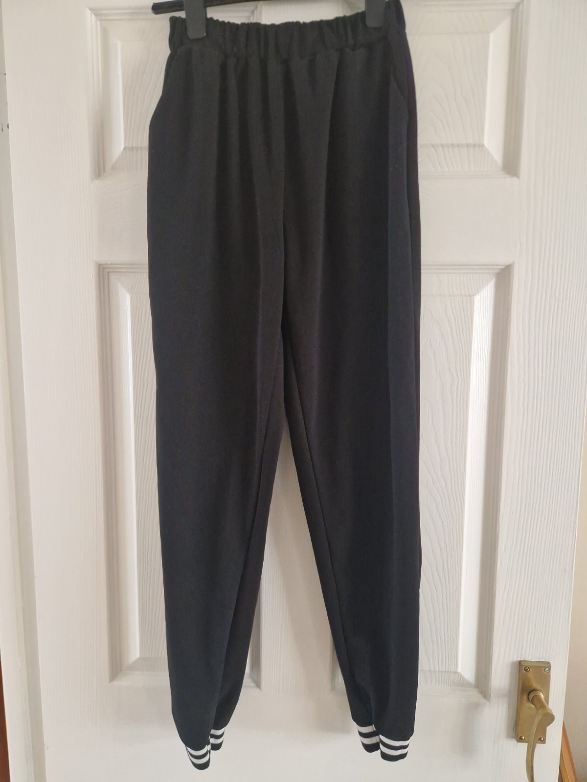 Womens Black smart trousers with cuffed hems